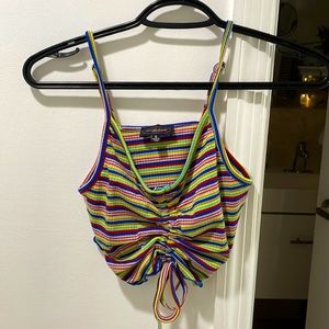 A small rainbow crop top that’s sinches